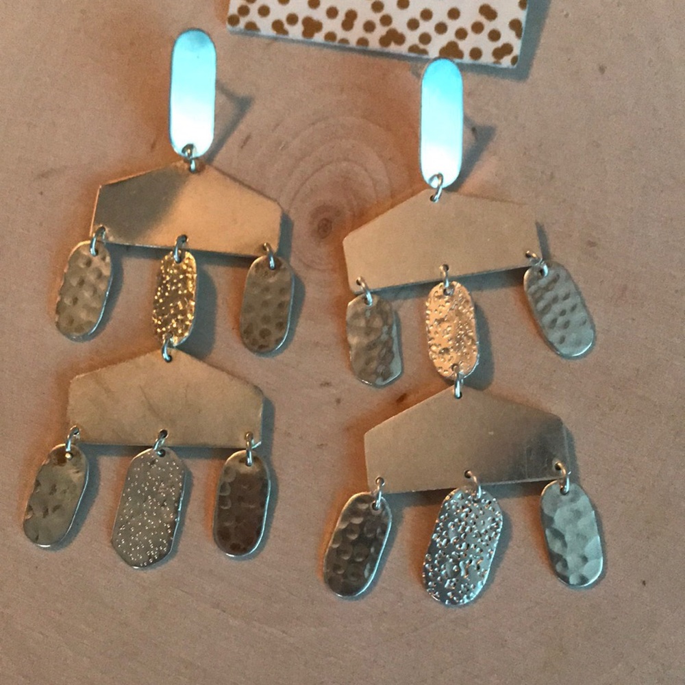 New Chic silver tiered earrings
